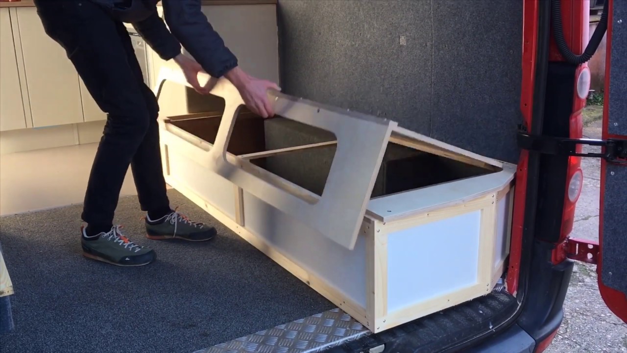 Extending, sliding, lifting bed with storage for camper van conversions